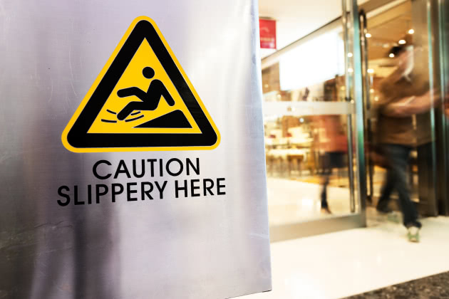 caution slippery here sign